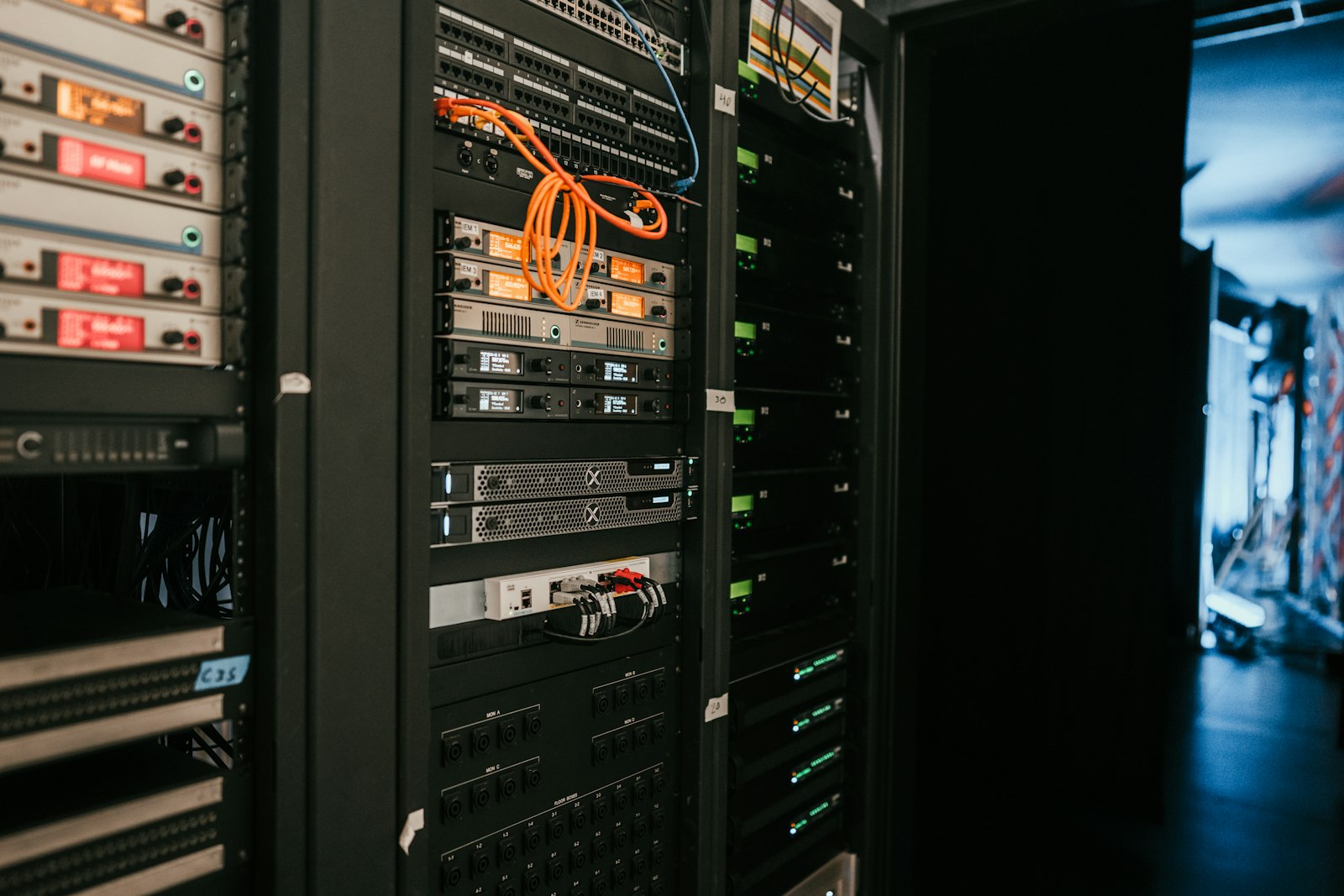 Dark server room representing the AI infrastructure behind the Qtum AI Router — illustration for the OpenClaw setup guide.